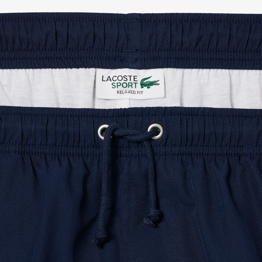 Men's Lacoste SPORT tennis shorts in solid diamond weave taffeta image number 6