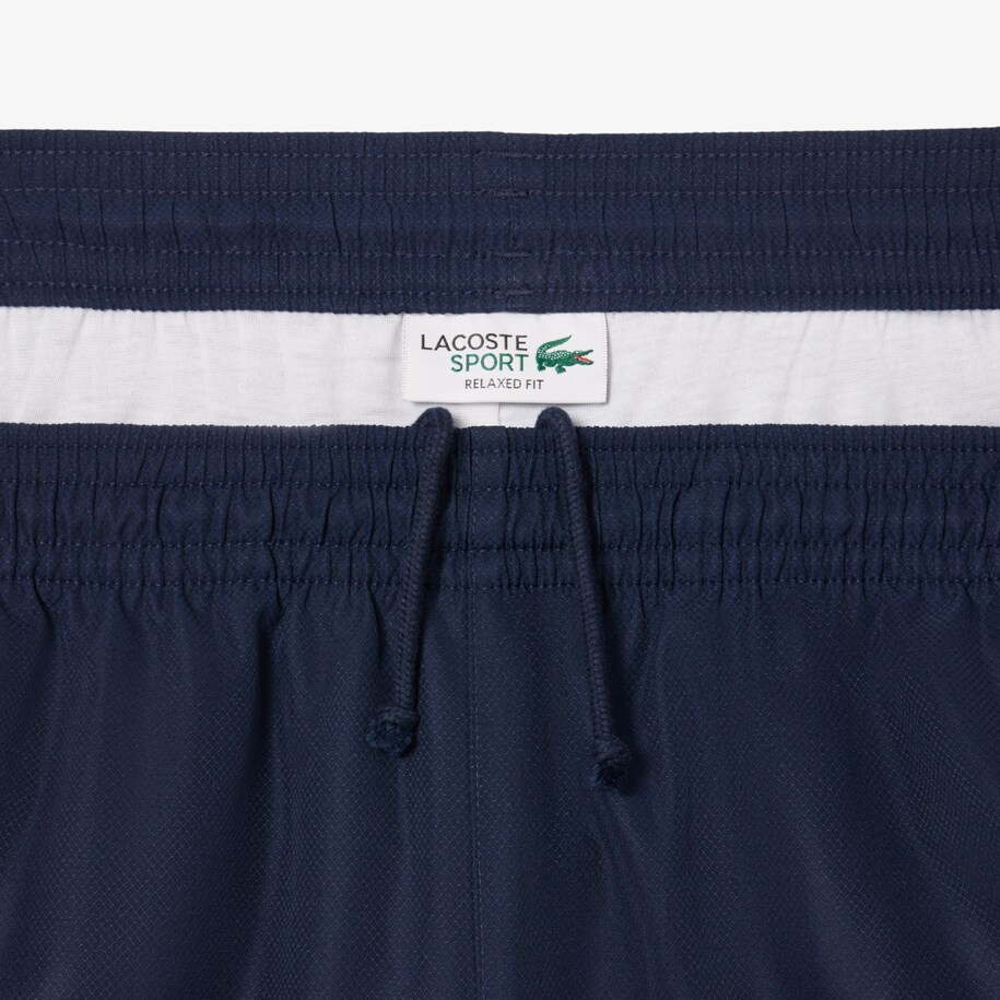 Celana Tenis Lightweight Bergaris Blok Warna image number 6