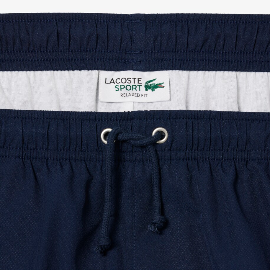 Men's Lacoste SPORT tennis shorts in solid diamond weave taffeta image number 6
